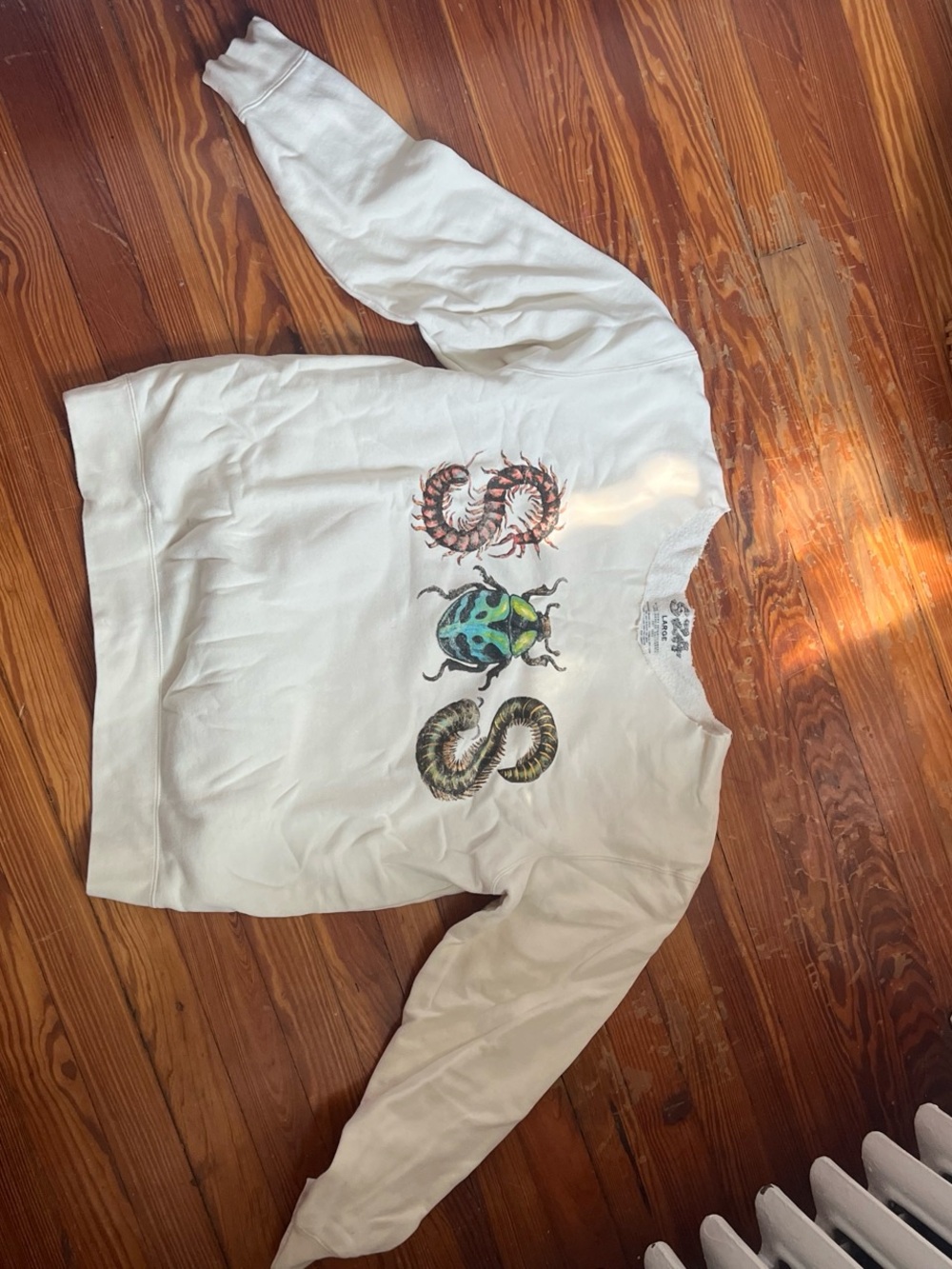 SZA SOS Tour White Graphic Crewneck Sweatshirt with Insect Motif